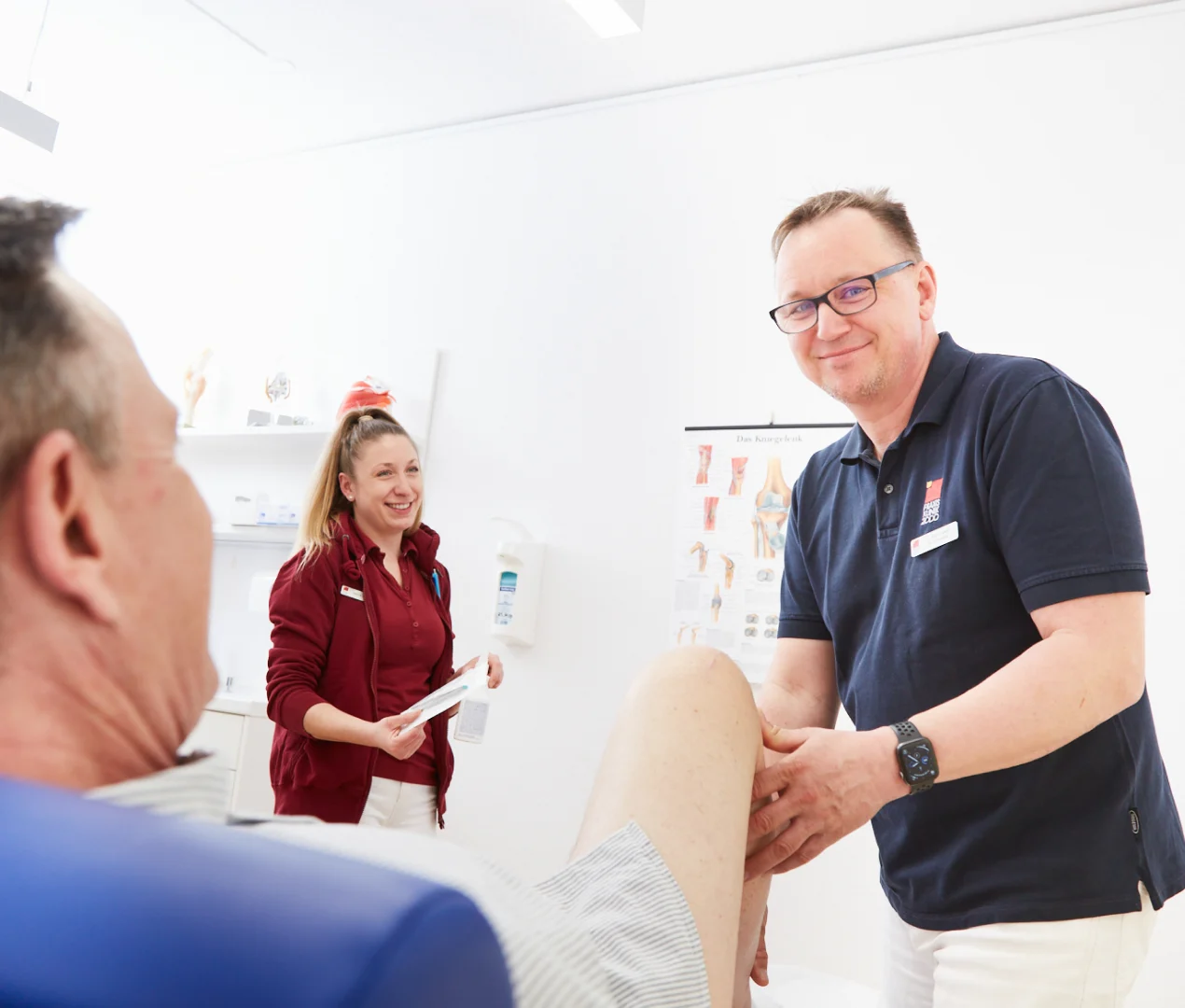 Dr Mayer examining a patient